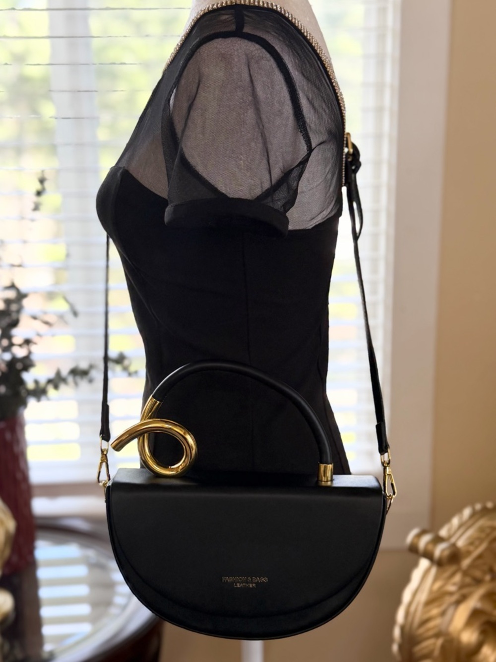 Black Crossbody Bag with Gold Accent - Designer Style